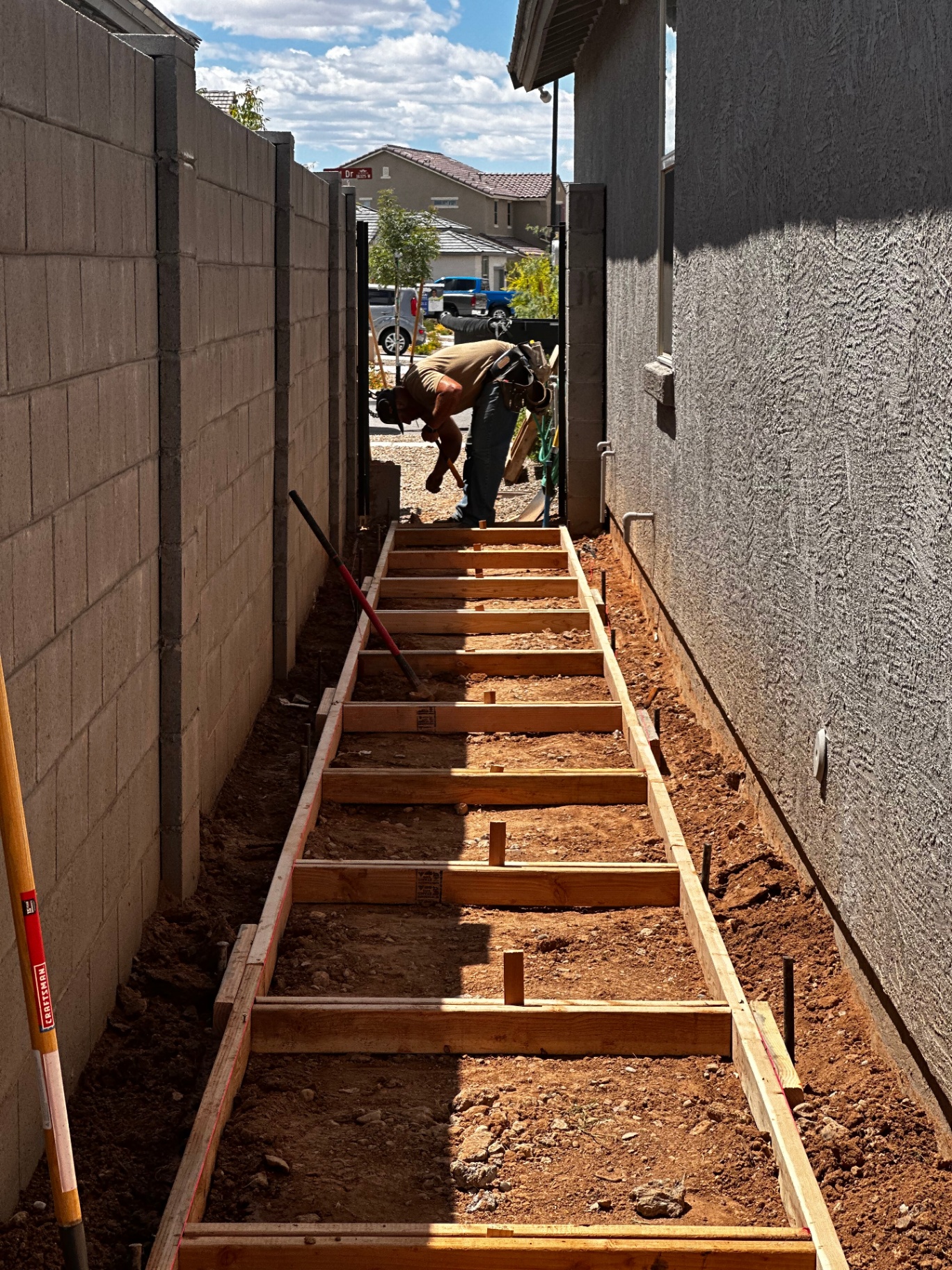 Side-Yard Walkway In Progress by Arizona Precision Concrete in Phoenix, AZ