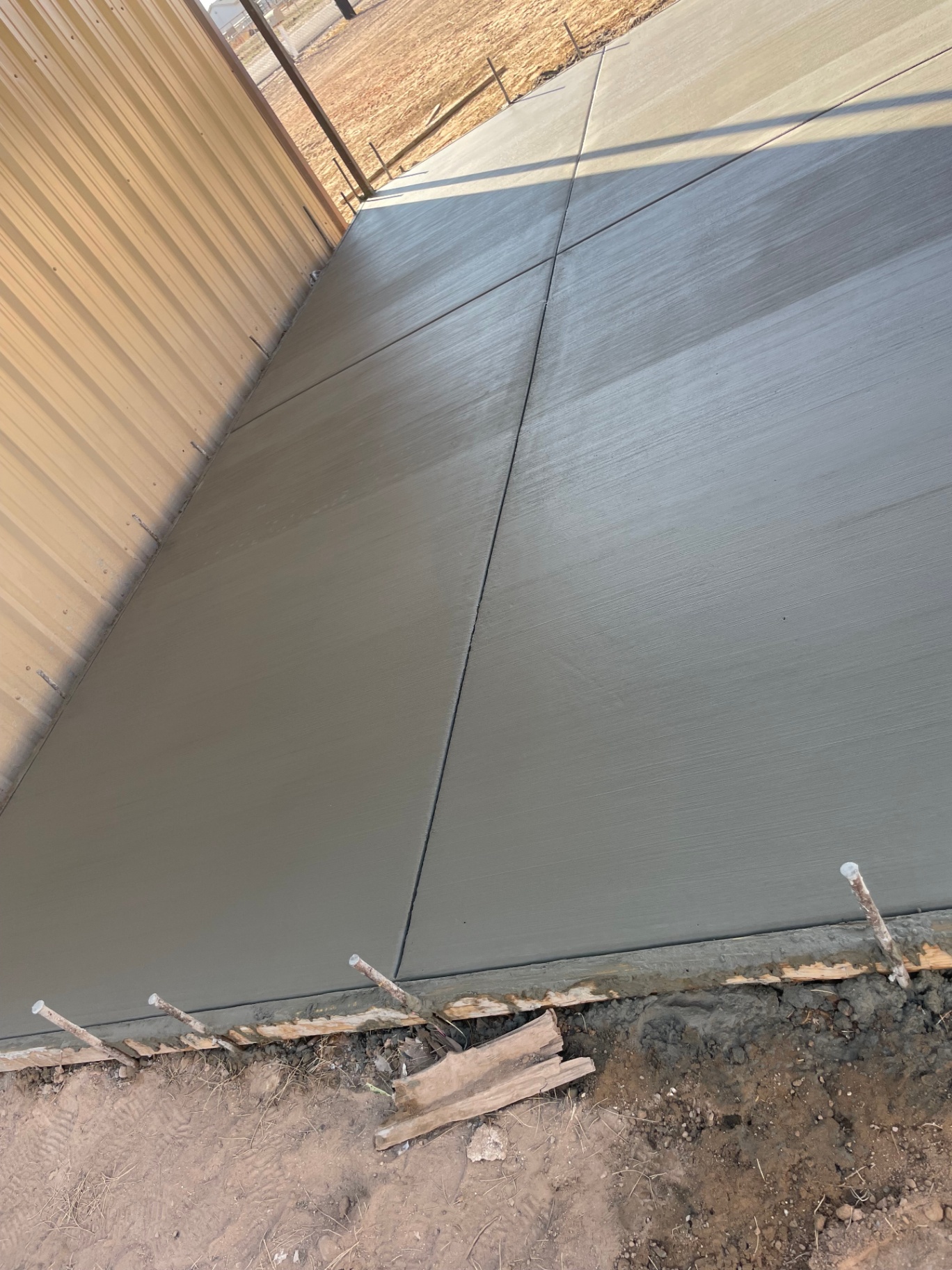 Broom-Finished Approach Slab by Arizona Precision Concrete in Goodyear, AZ