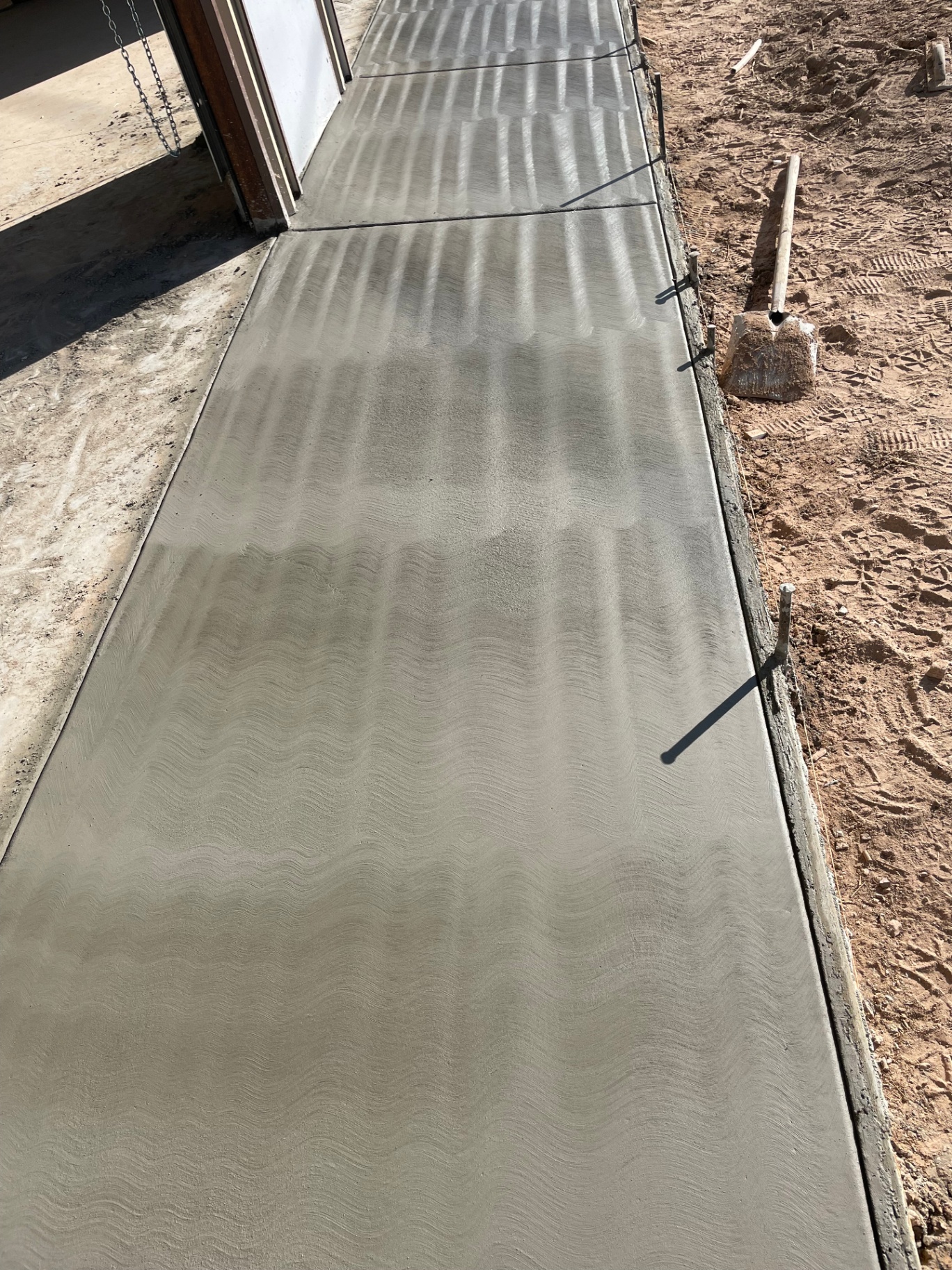 Broom-Finished Concrete Walkway by Arizona Precision Concrete in Buckeye, AZ